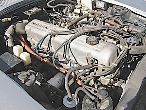 Photo 3: Compared to modern vehicles, the 1976 Datsun's 280Z’s engine compartment is very accessible.