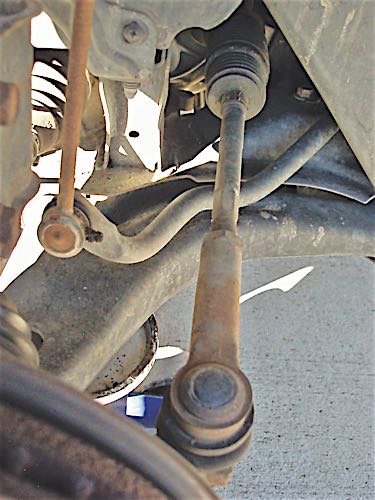 Photo 4: The tie rod should be straight and the outer end at a normal operating angle to the steering knuckle.